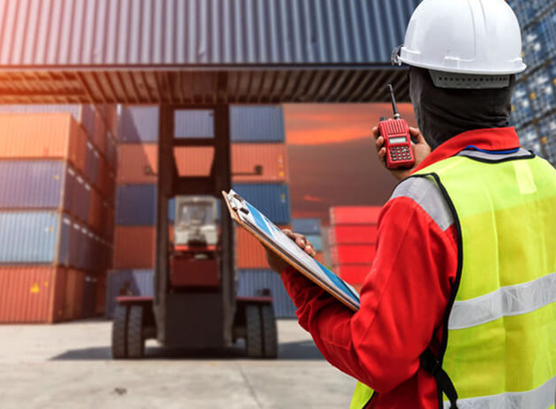 Carrying and forwarding agency worker at a container yard