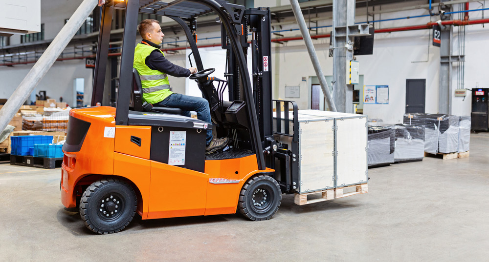 Forklift operating inside a warehouse