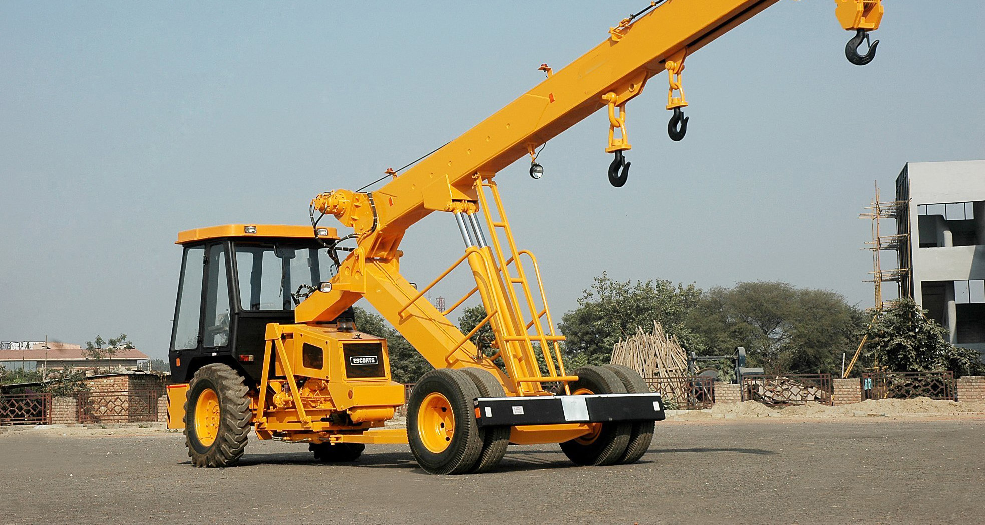 Hydra crane lifting equipment at an industrial yard